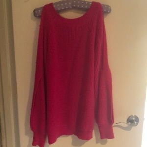 Hot pink sweater with arm cutouts